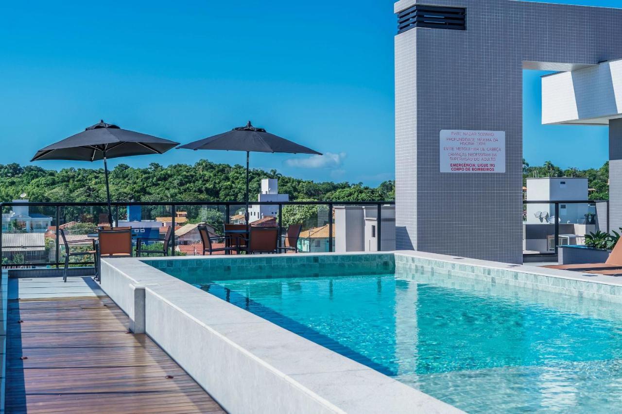 Adra 301: Beachfront Apartment with Rooftop Pool in Bombinhas Center Exterior photo